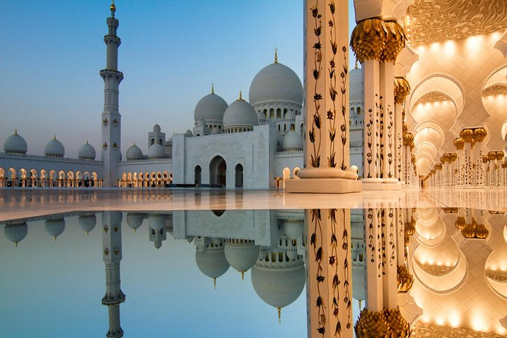 Explore the stunning blend of Islamic architecture and serene reflections at Sheikh Zayed Grand Mosque a must-see on your Abu Dhabi adventure. Uncover the city's rich heritage in style.